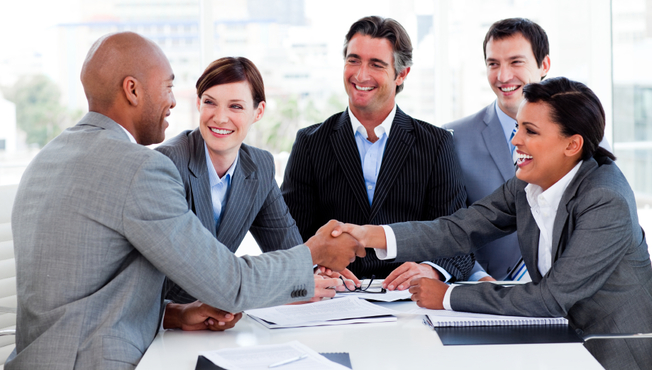 Desktop smiling handshake
